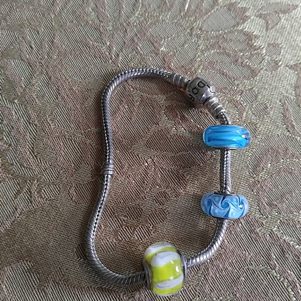 Authentic pandora bracelet with 3 charms